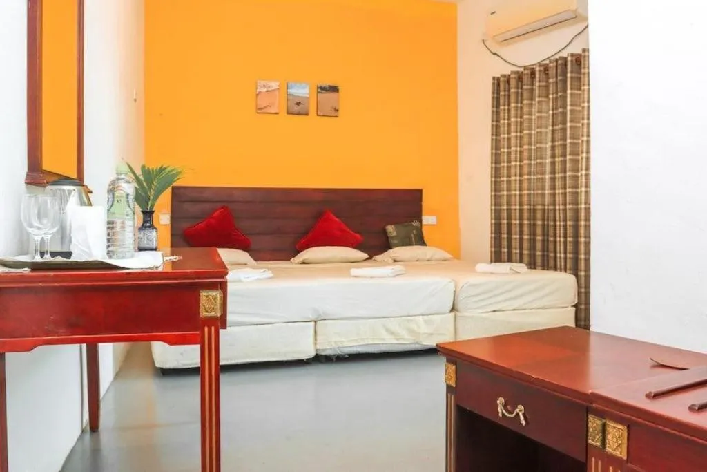 Bed in New Tristar Beach Hotel