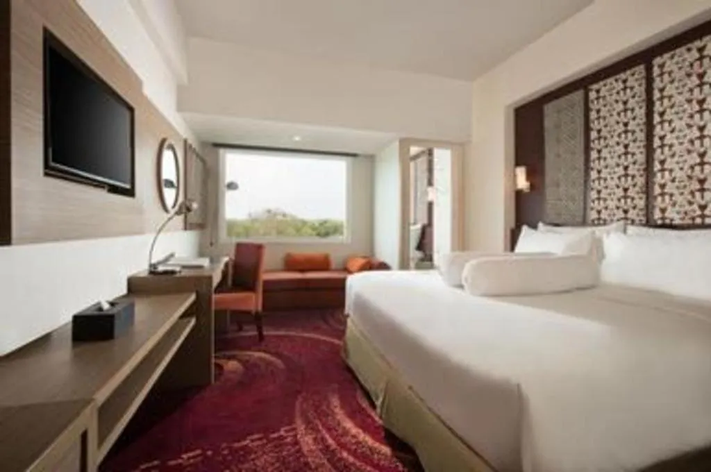 Bed in Indoluxe Hotel Jogjakarta