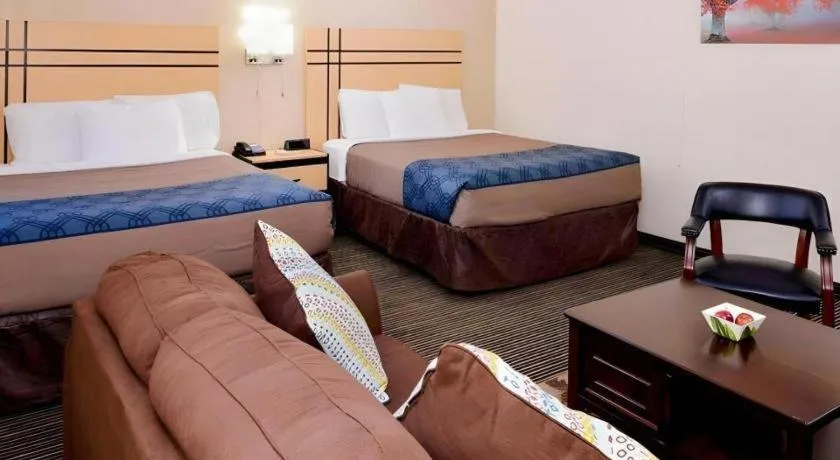 Bed in Econo Lodge Rochester I-90 & I-390