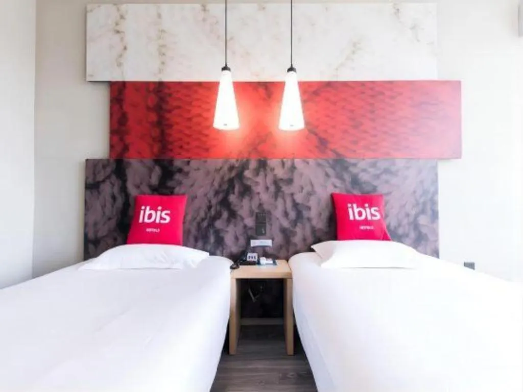 Bed in Ibis Nantong Qingnian