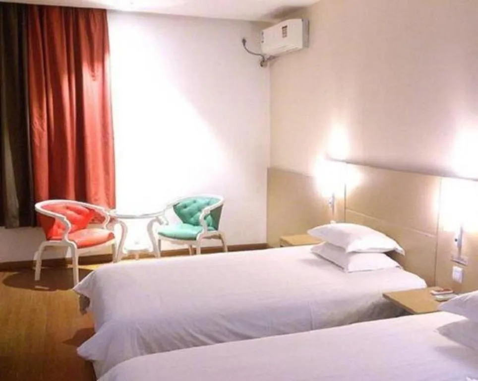 Bed in Ibis Nantong Qingnian