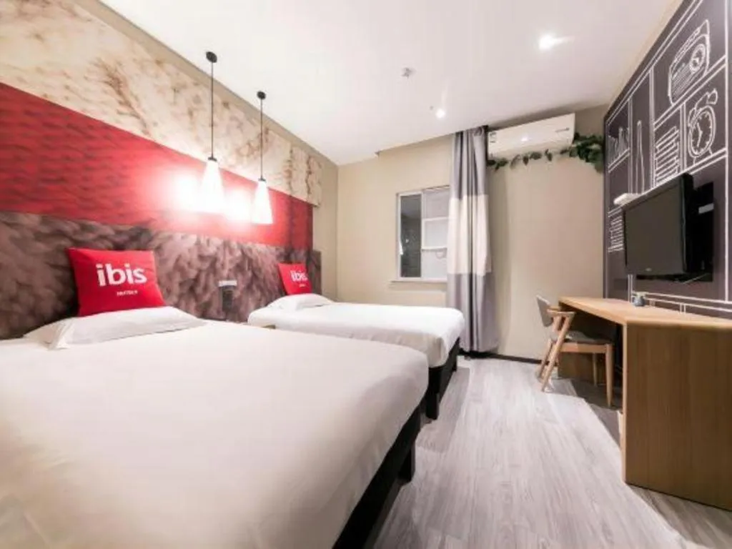 Bed in Ibis Nantong Qingnian