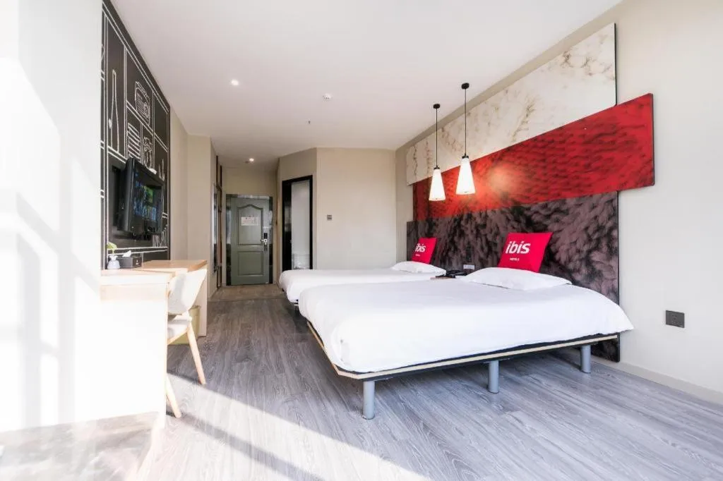 Bed in Ibis Nantong Qingnian