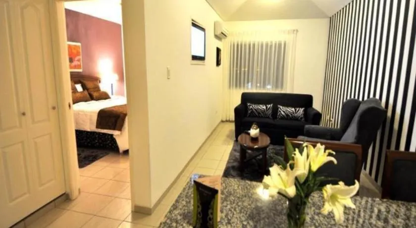 Bed in Terranova Suites