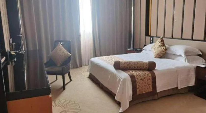 Bed in Jiuhua Jin Jiang International Hotel