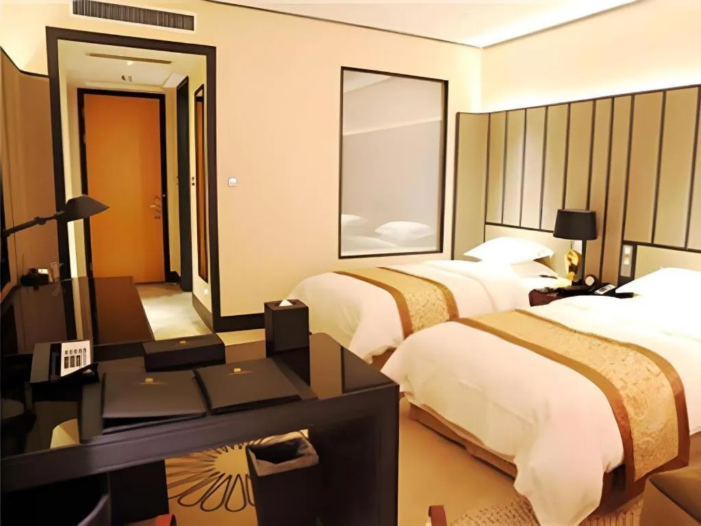 Bed in Jiuhua Jin Jiang International Hotel