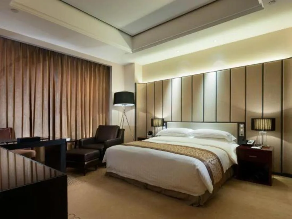 Bed in Jiuhua Jin Jiang International Hotel