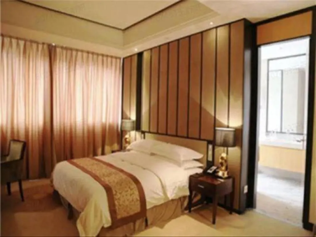 Bed in Jiuhua Jin Jiang International Hotel