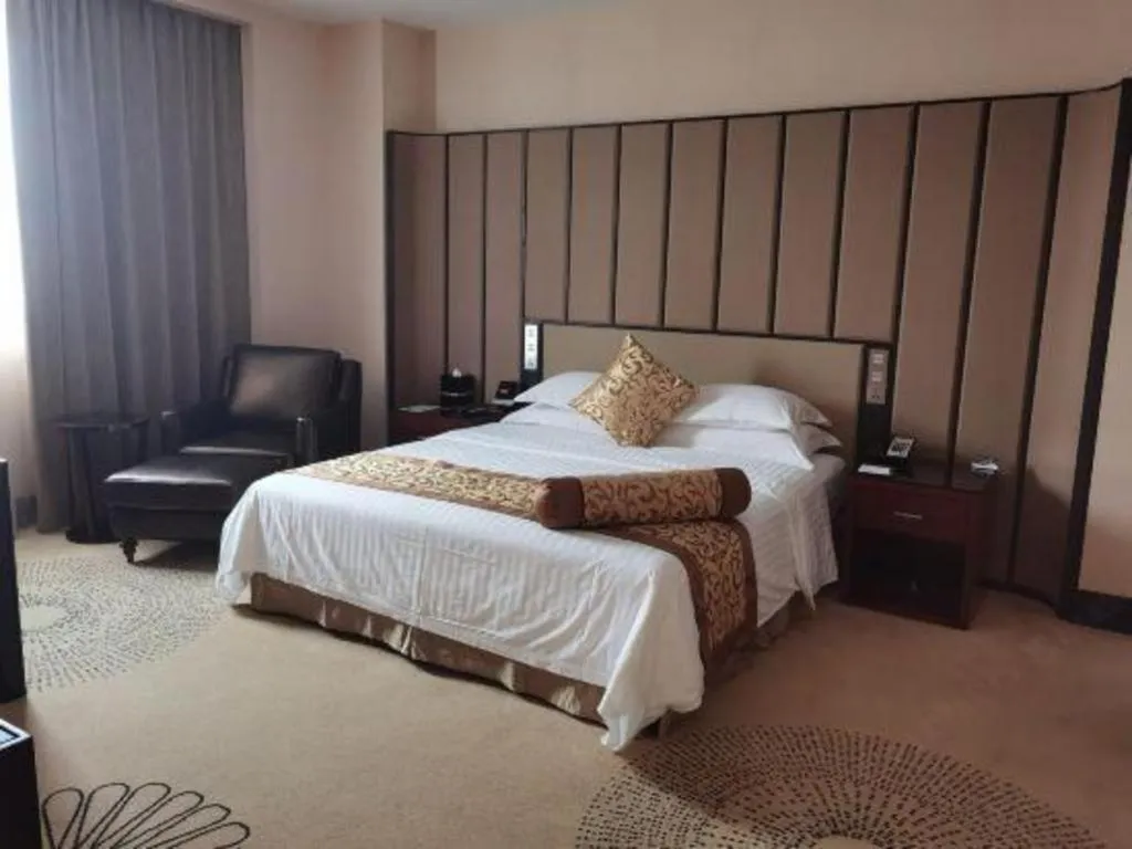 Bed in Jiuhua Jin Jiang International Hotel