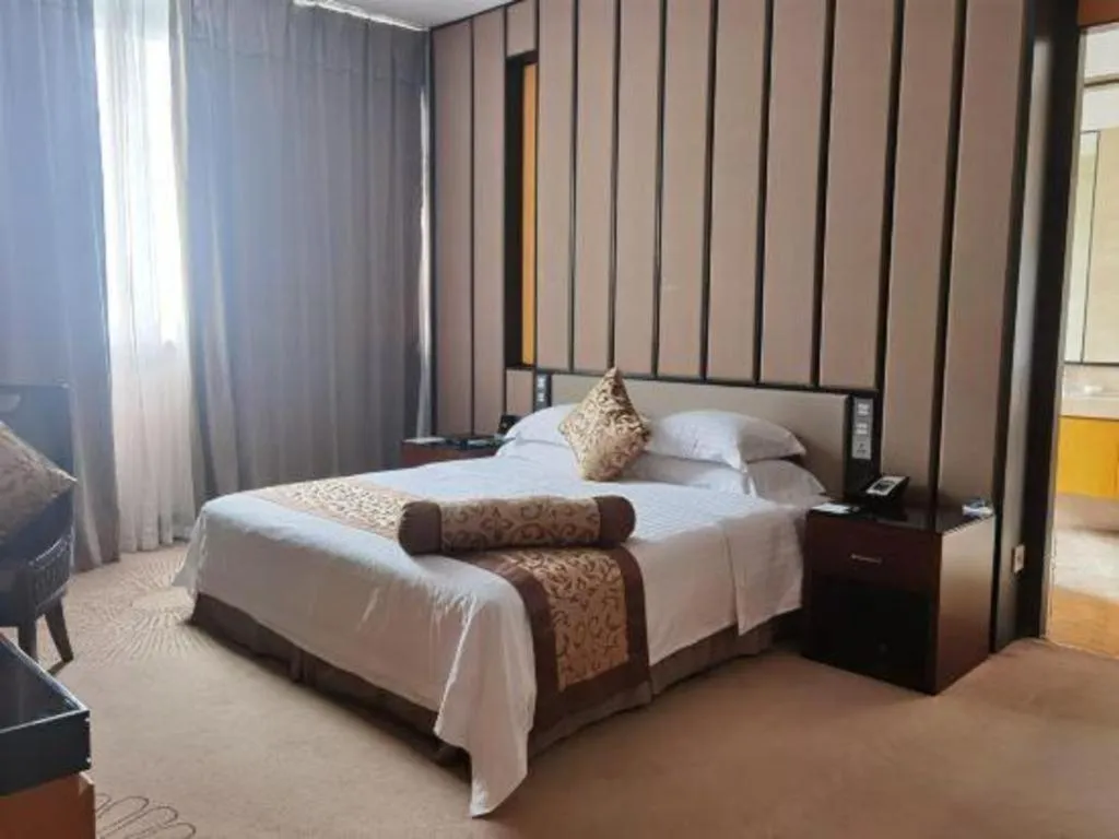 Bed in Jiuhua Jin Jiang International Hotel
