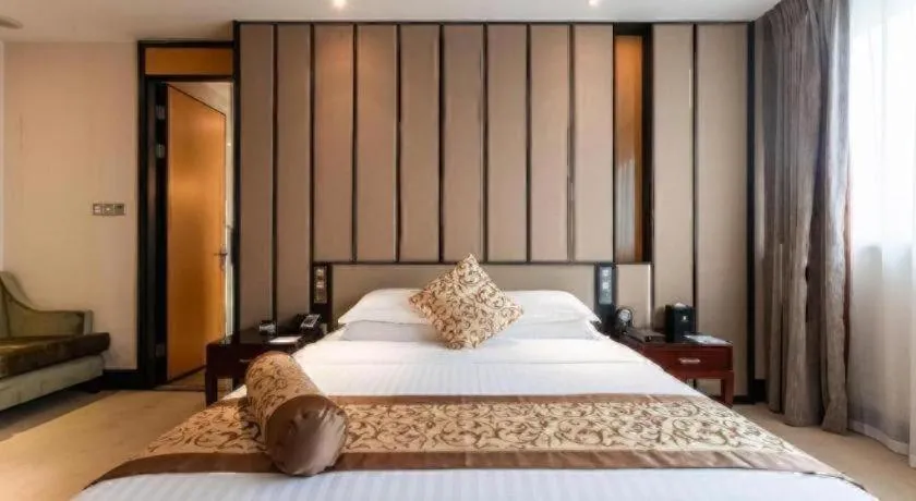 Bed in Jiuhua Jin Jiang International Hotel