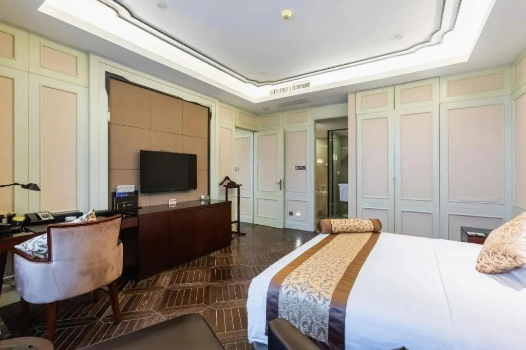 Bed in Jiuhua Jin Jiang International Hotel