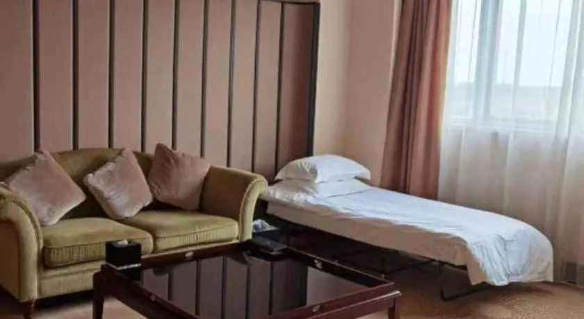 Bed in Jiuhua Jin Jiang International Hotel
