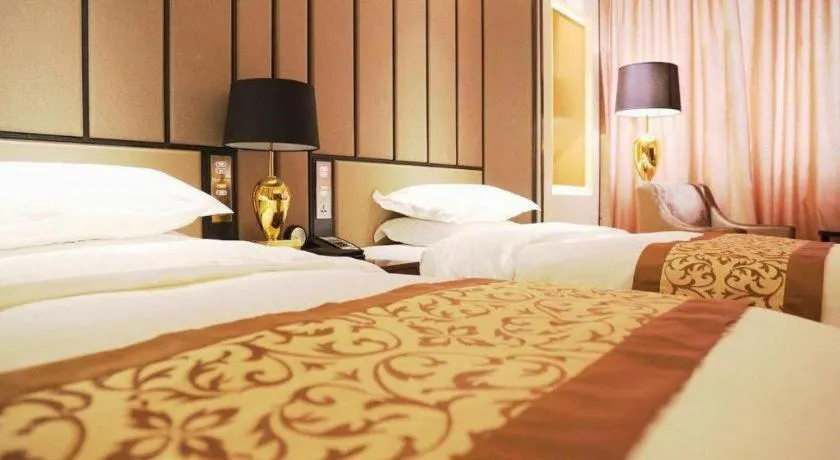 Bed in Jiuhua Jin Jiang International Hotel