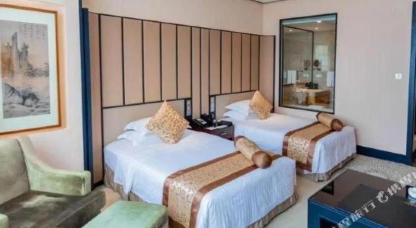 Bed in Jiuhua Jin Jiang International Hotel