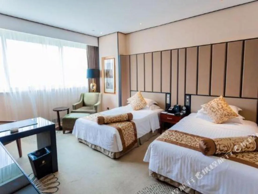 Bed in Jiuhua Jin Jiang International Hotel