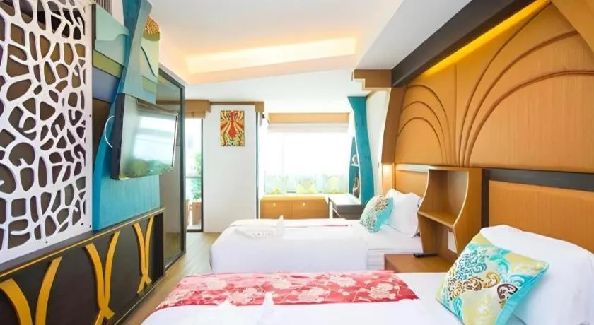 Bed in Phi Phi Nice Beach Hotel Hip