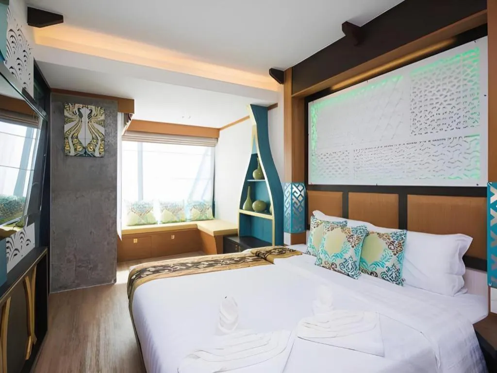 Bed in Phi Phi Nice Beach Hotel Hip