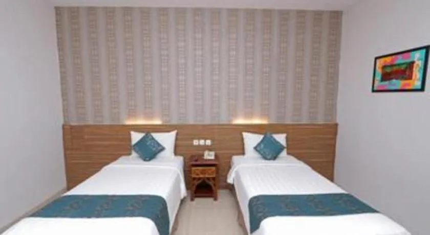 Bed in Grand Amira Hotel Solo, Azana Hotels Collection