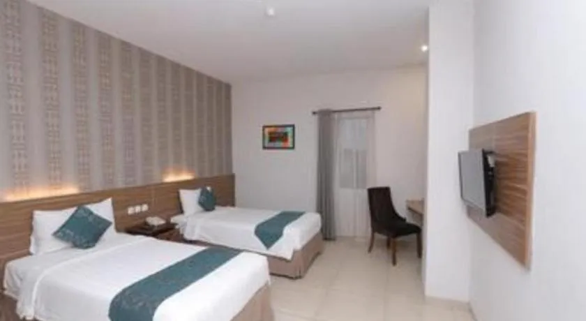 Bed in Grand Amira Hotel Solo, Azana Hotels Collection