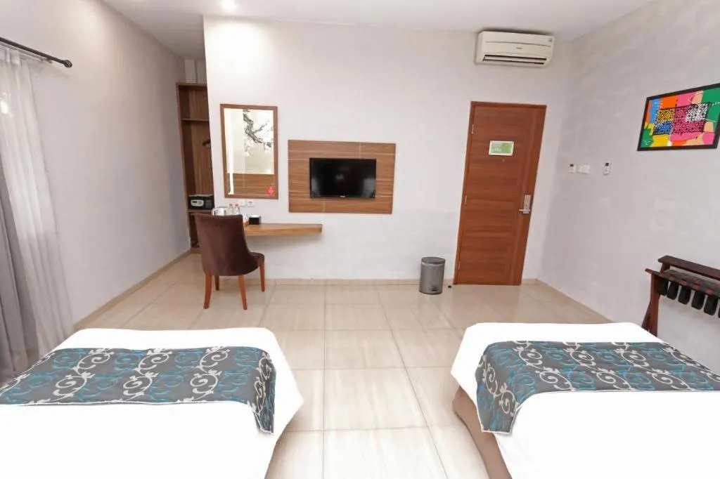 Bed in Grand Amira Hotel Solo, Azana Hotels Collection