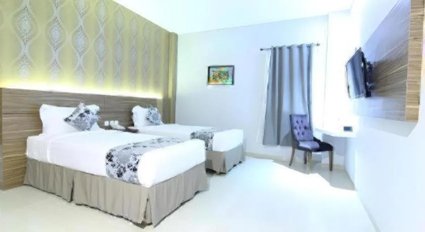 Bed in Grand Amira Hotel Solo, Azana Hotels Collection