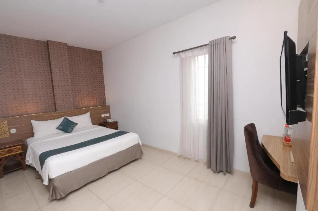 Bed in Grand Amira Hotel Solo, Azana Hotels Collection