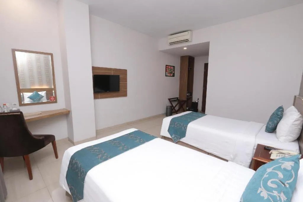 Bed in Grand Amira Hotel Solo, Azana Hotels Collection