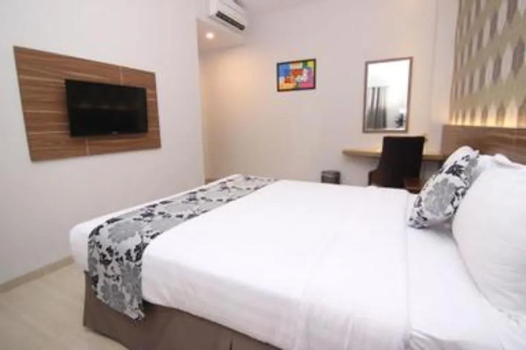 Bed in Grand Amira Hotel Solo, Azana Hotels Collection