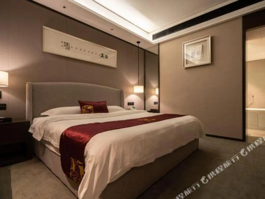 Bed in Zhuhai Starlight Hotel