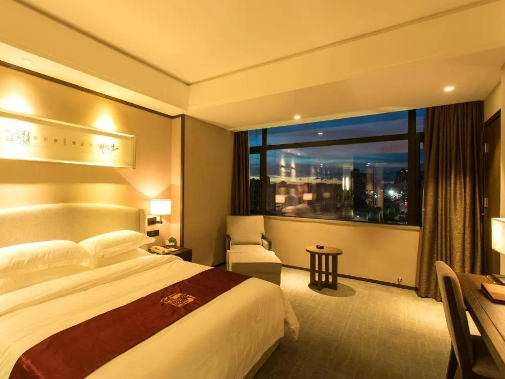 Bed in LIZ Hotel (Zhuhai Gongbei Port Fuhuali Store)