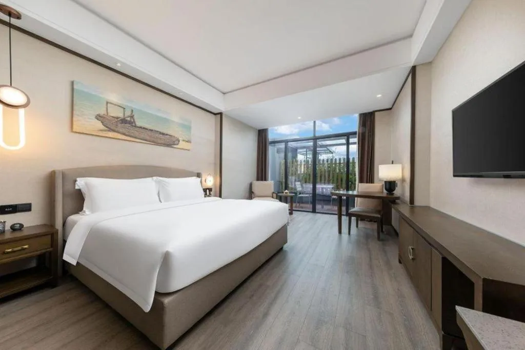 Bed in Zhuhai Starlight Hotel