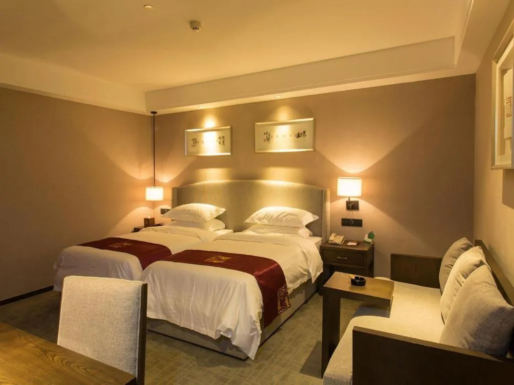 Bed in Zhuhai Starlight Hotel