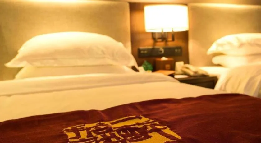 Bed in LIZ Hotel (Zhuhai Gongbei Port Fuhuali Store)
