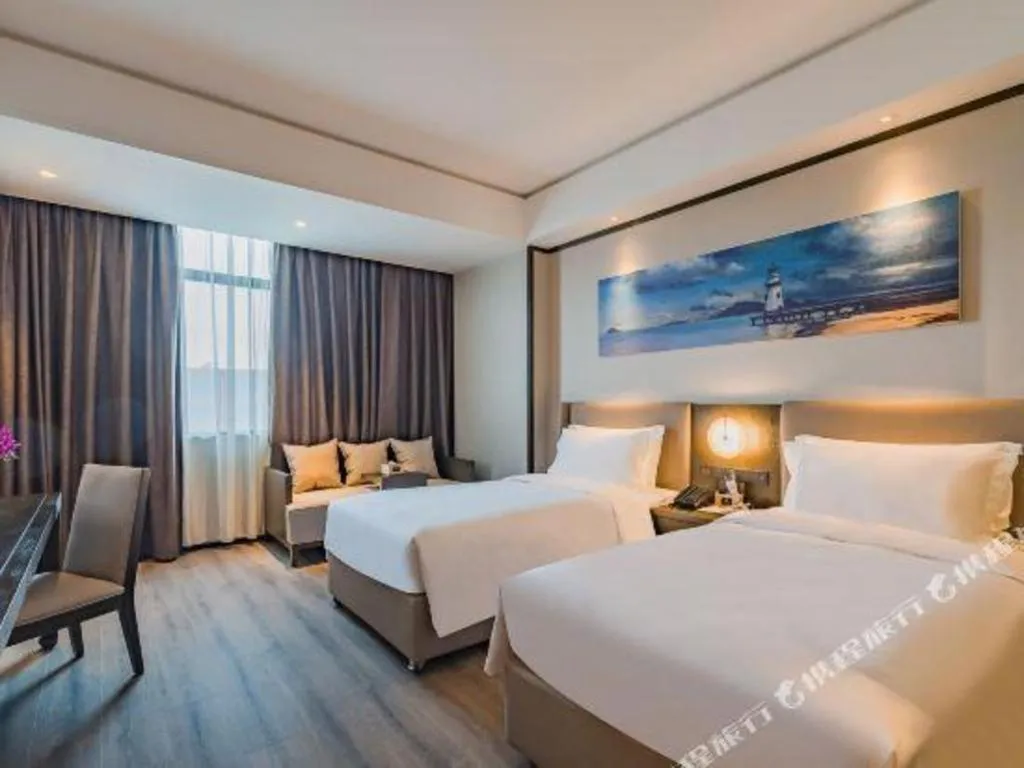 Bed in Zhuhai Starlight Hotel