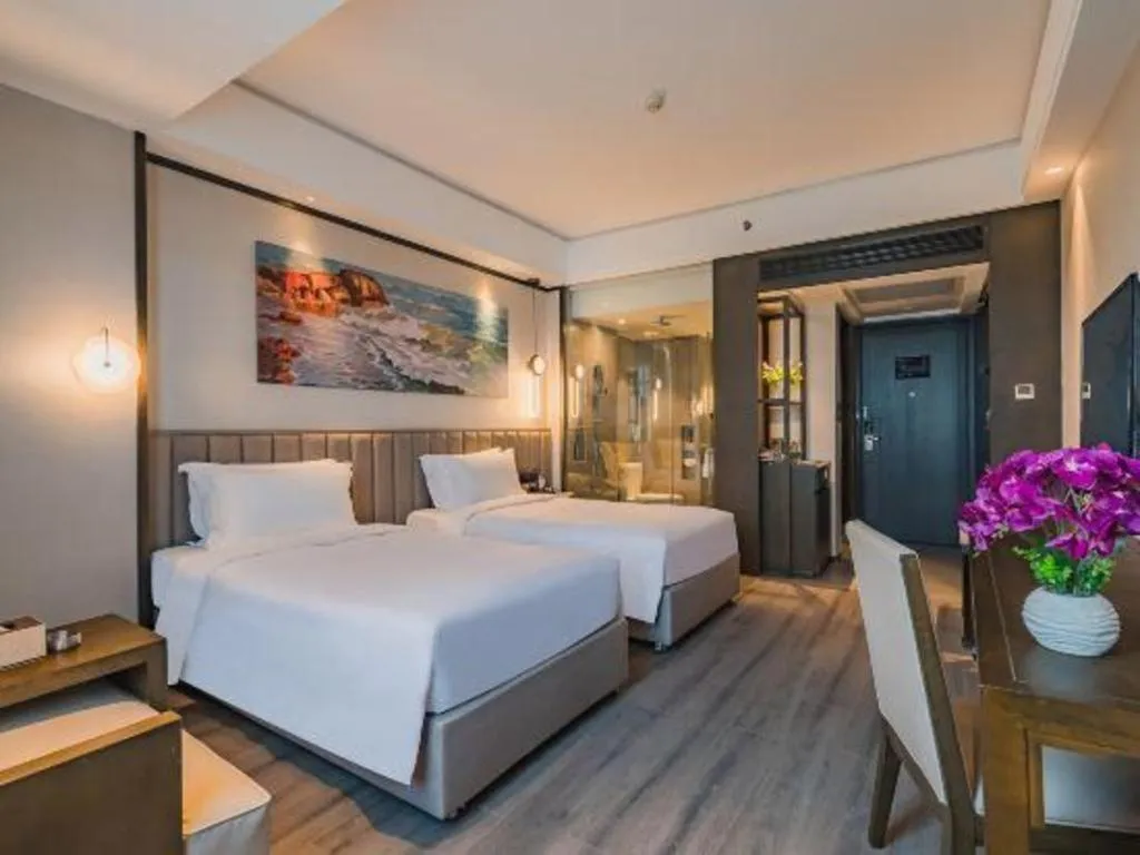 Bed in Zhuhai Starlight Hotel