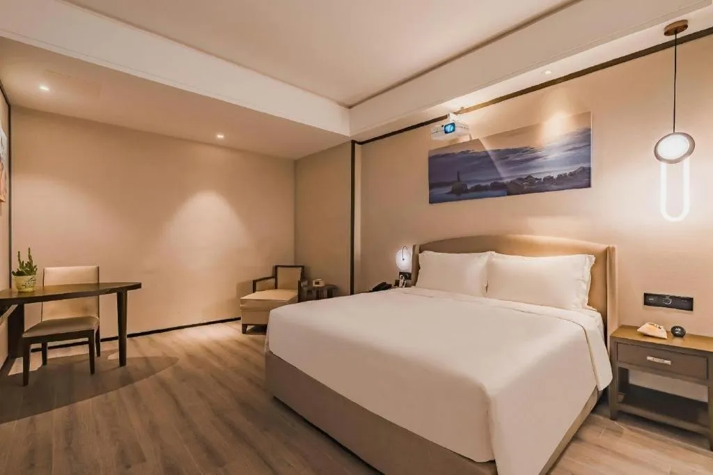 Bed in Zhuhai Starlight Hotel