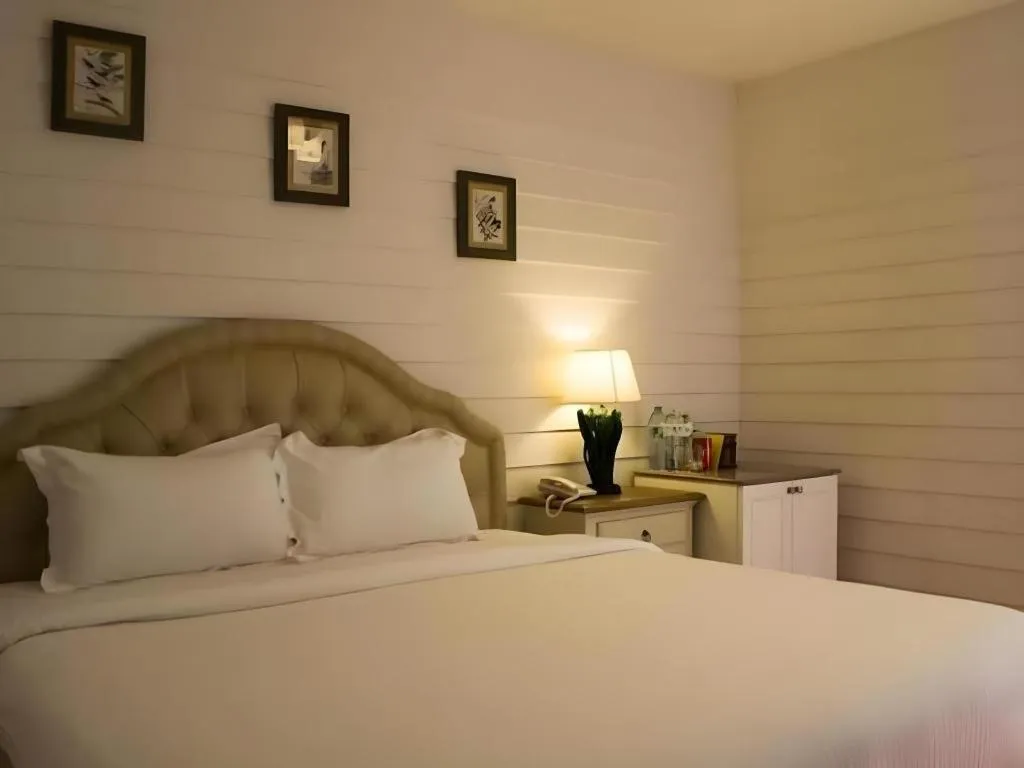 Bed in Ban Thungdang Housetel Bangkok