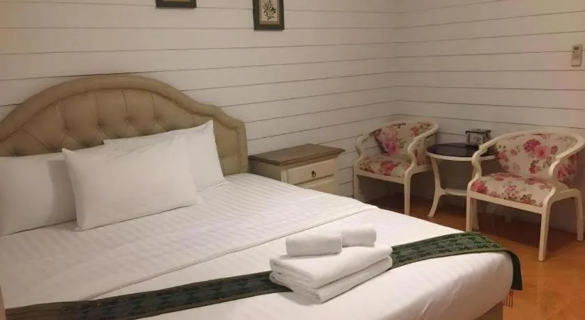 Bed in Ban Thungdang Housetel Bangkok