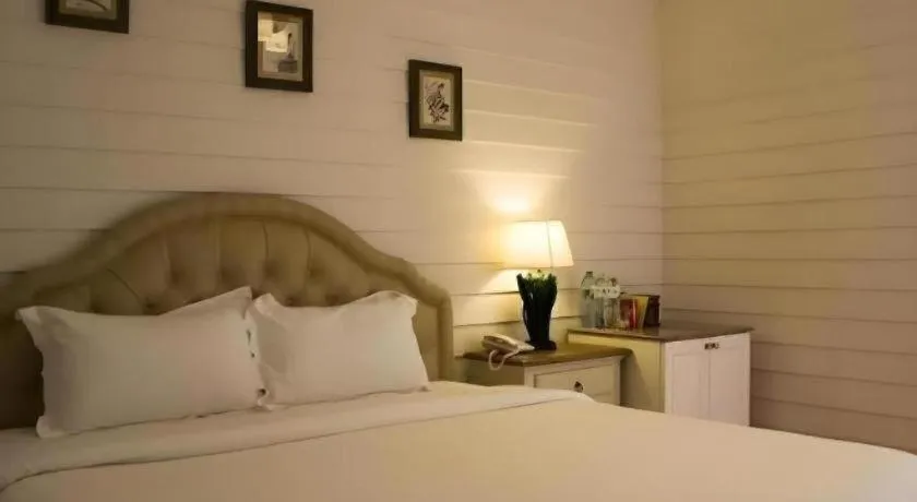 Bed in Ban Thungdang Housetel Bangkok