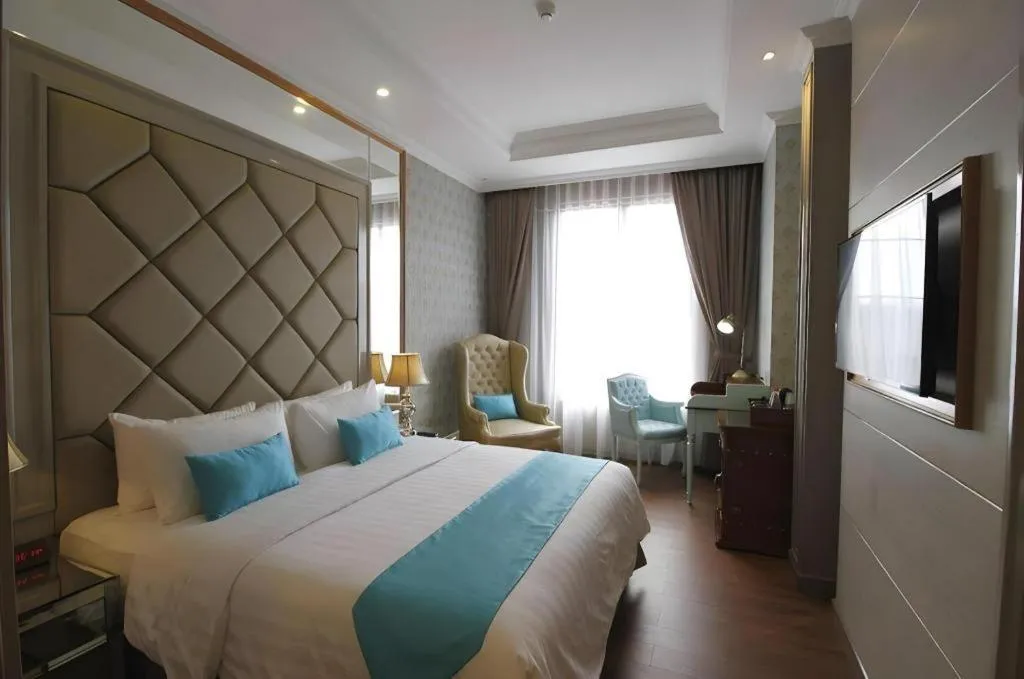 Bed in d'primahotel Bandung