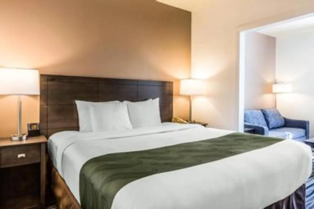 Bed in Ramada Suites by Wyndham San Diego