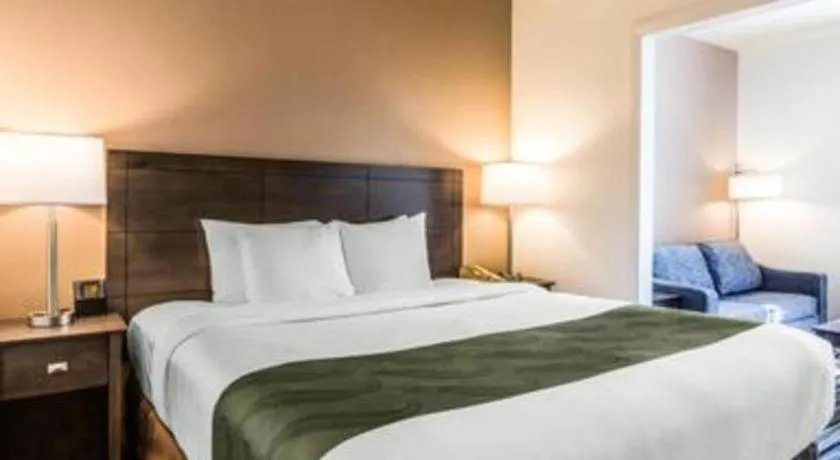 Bed in Ramada Suites by Wyndham San Diego