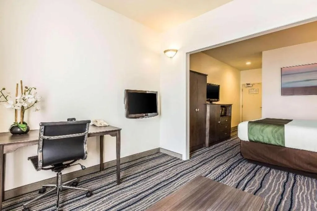 Bed in Ramada Suites by Wyndham San Diego