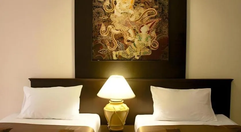 Bed in Grand Pinnacle Hotel