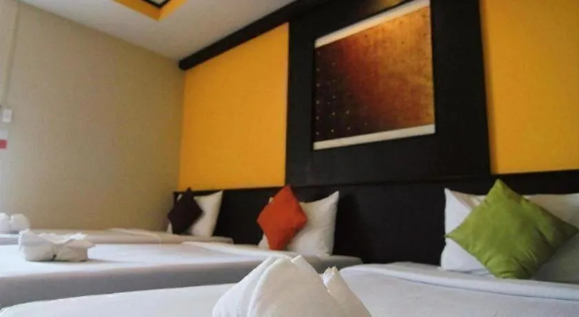 Bed in Grand Pinnacle Hotel