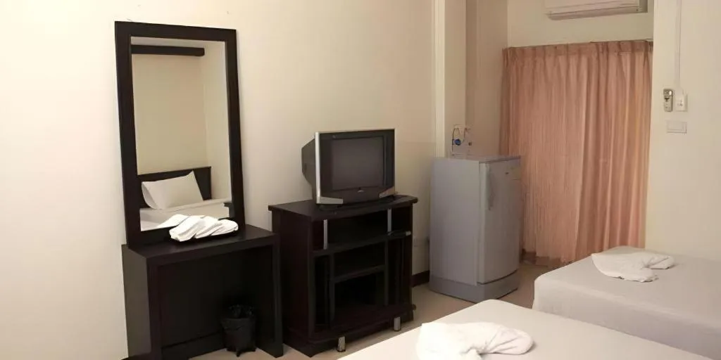 Bed in Grand Pinnacle Hotel