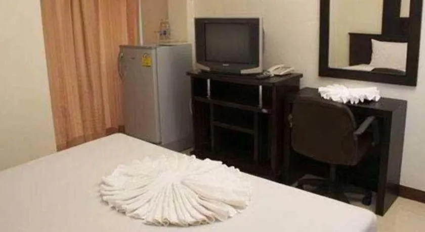 Bed in Grand Pinnacle Hotel