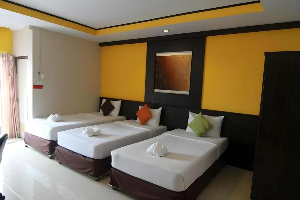 Bed in Grand Pinnacle Hotel