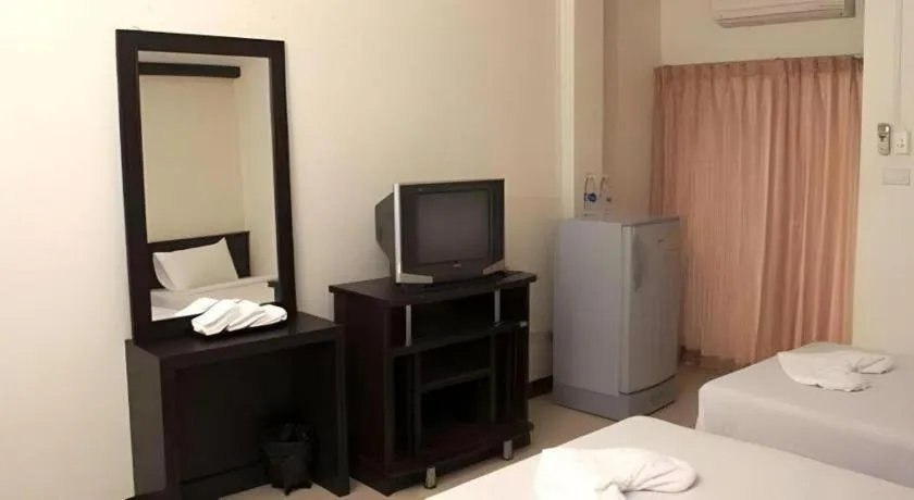 Bed in Grand Pinnacle Hotel